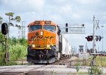 A BNSF train comes souwh through T&NO Junction 